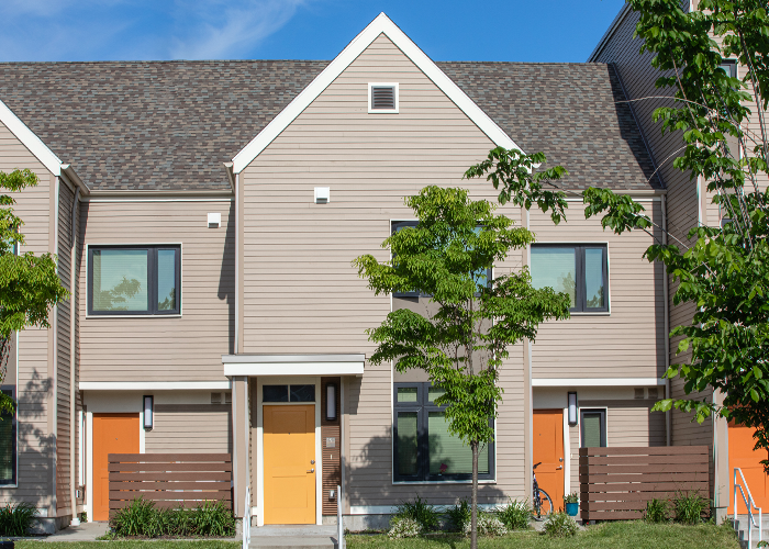 Exterior shot of apartment complex front doors.